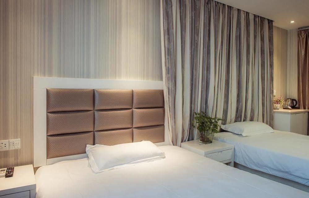 Milan Fashion Hotel Deqing Bagian luar foto